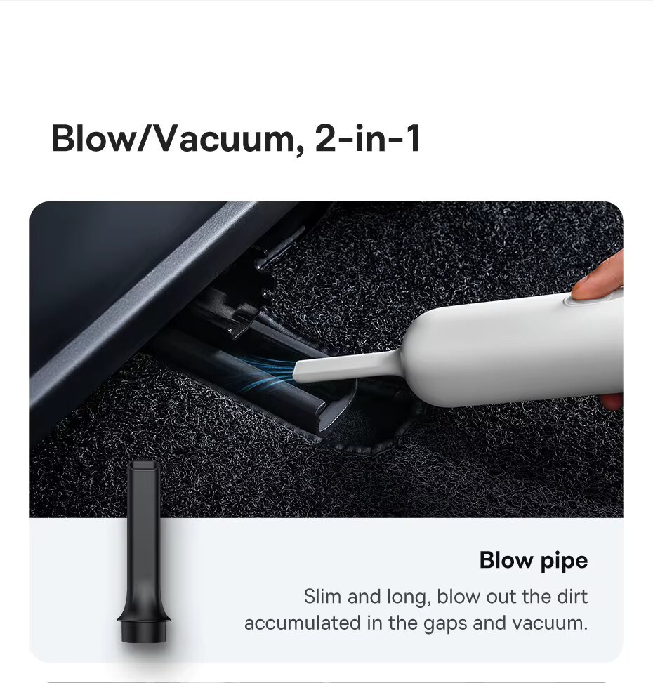 Baseus A2 Pro blow nozzle clearing dust from a gap under a car seat